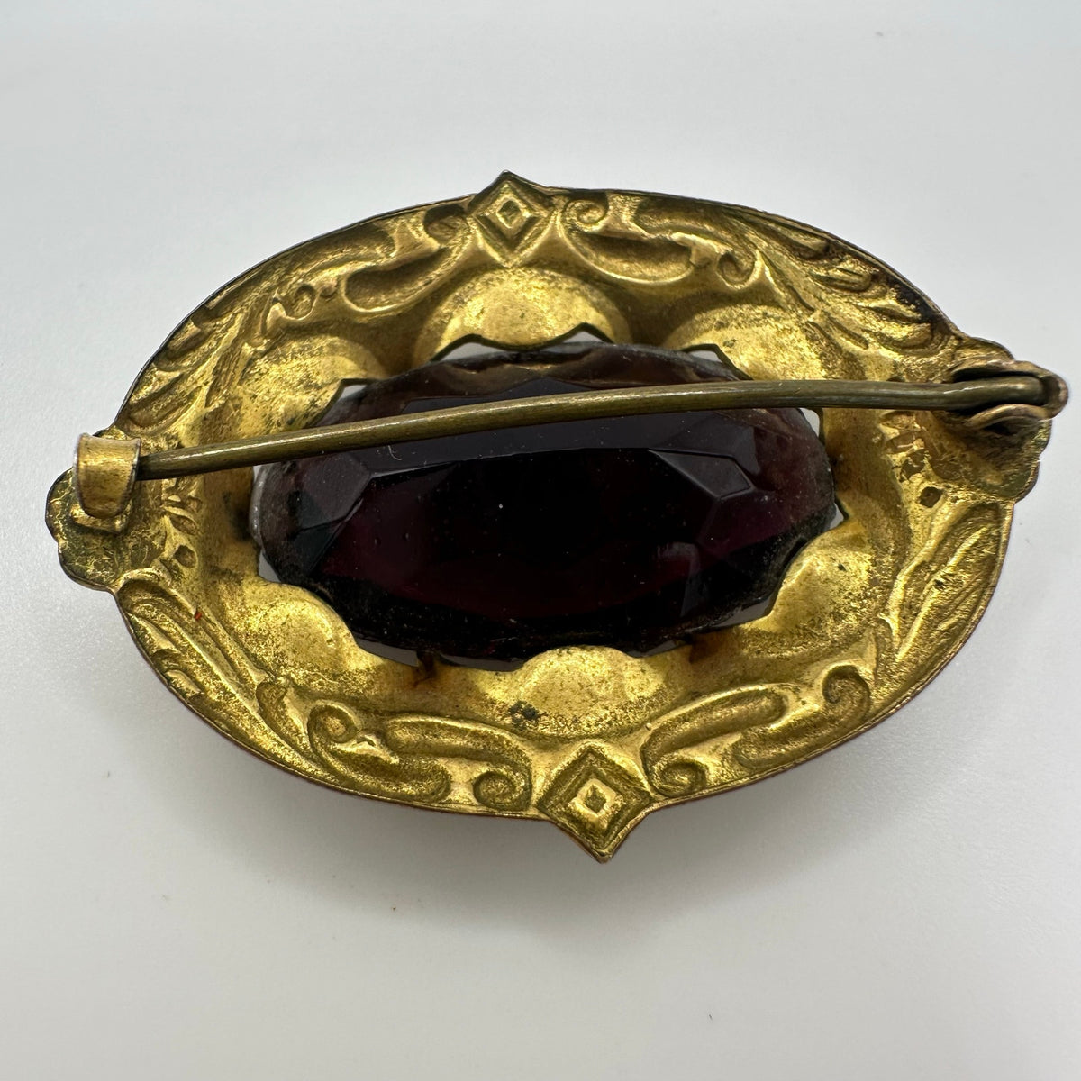 Antique 1900s Arts Crafts Nouveau gold gilt brass purple glass sash pin brooch