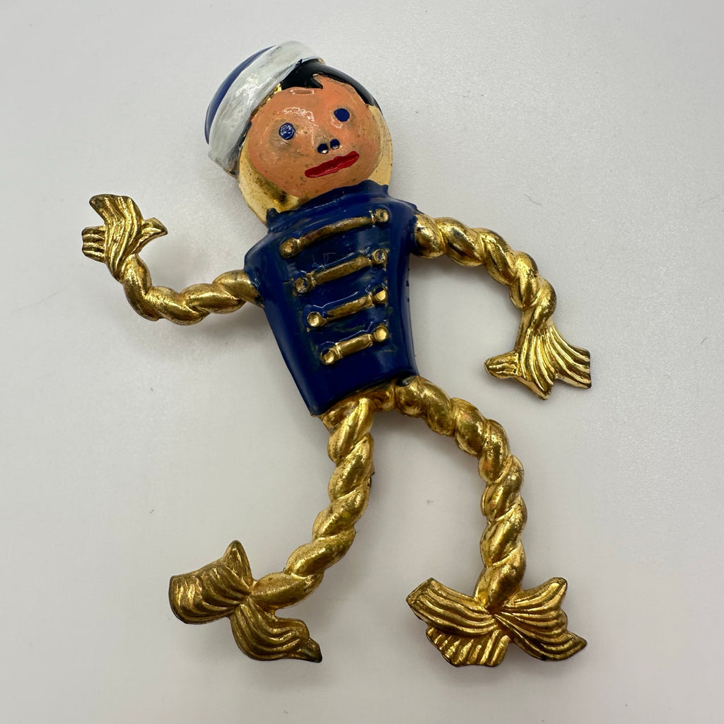Antique Art Deco 1930s enamel brass boy bellhop Figural rope brooch pin