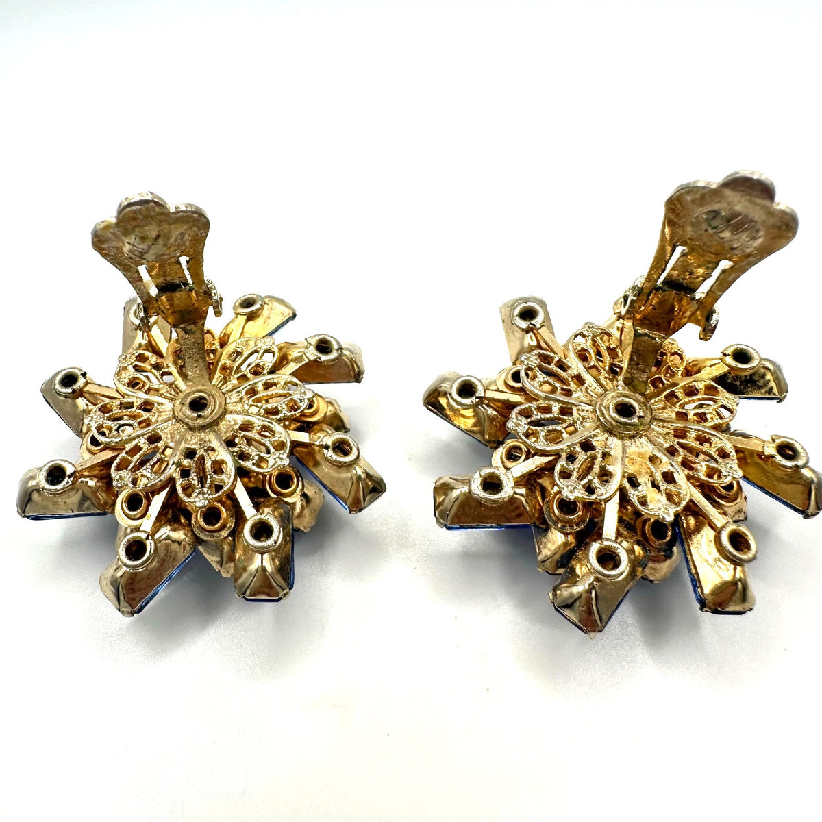 Vintage gold tone large royal blue glass rhinestones starburst clip on earrings