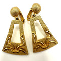 Vintage 1980s 1990s gold tone dangle drop geometric statement clip on earrings