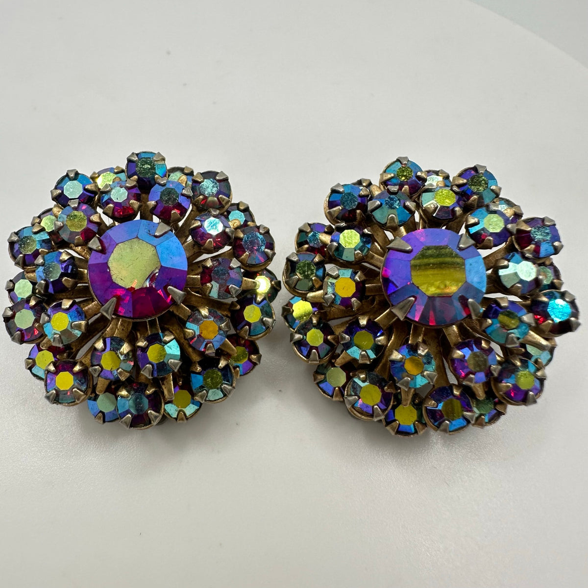 Vintage 1950s gold tone red aurora borealis AB rhinestones clip on earrings