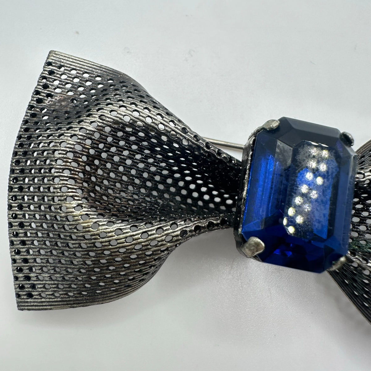 Vintage silver pewter tone mesh metal large blue glass rhinestone bow brooch