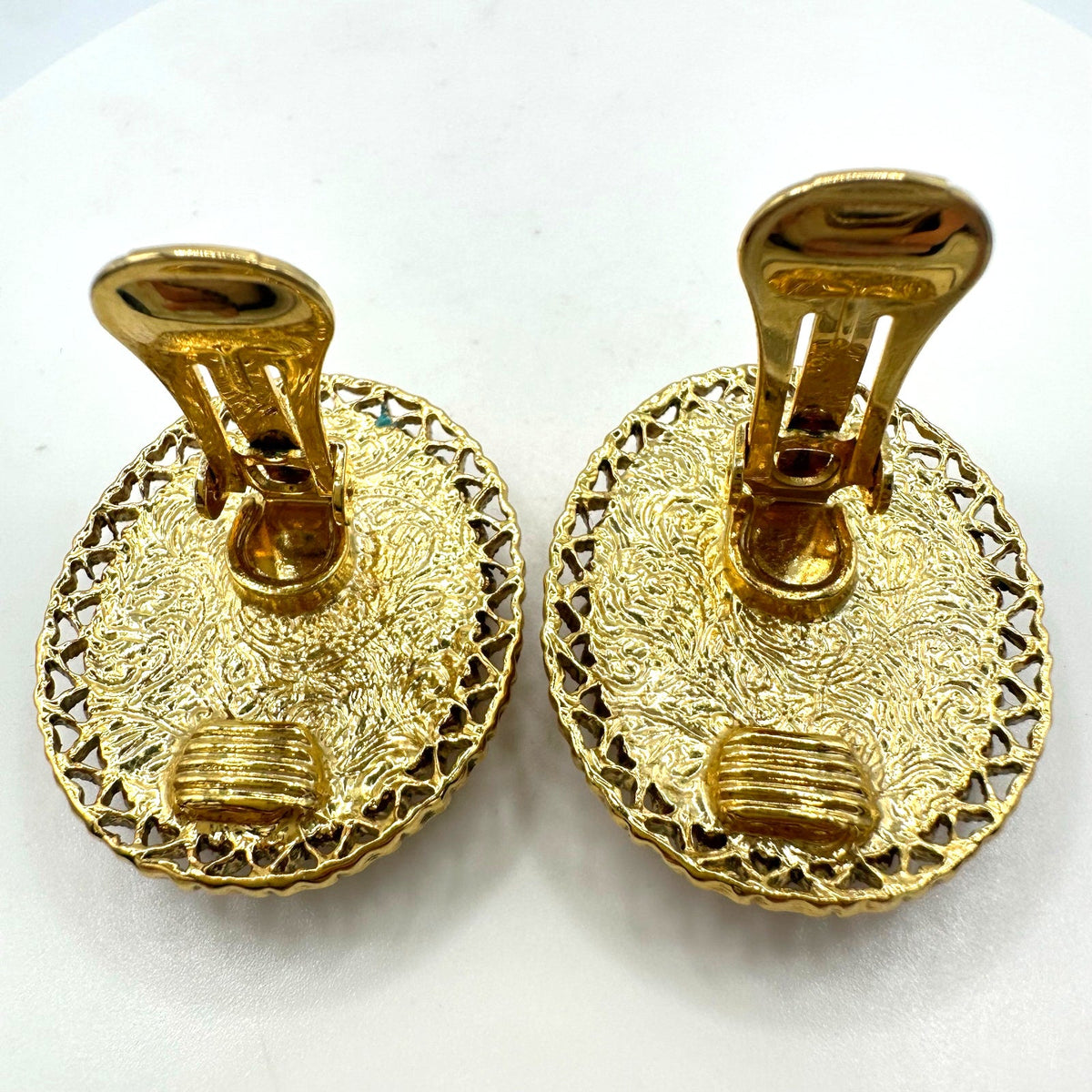 1928 signed gold tone pink resin cameo woman's face oval clip on earrings