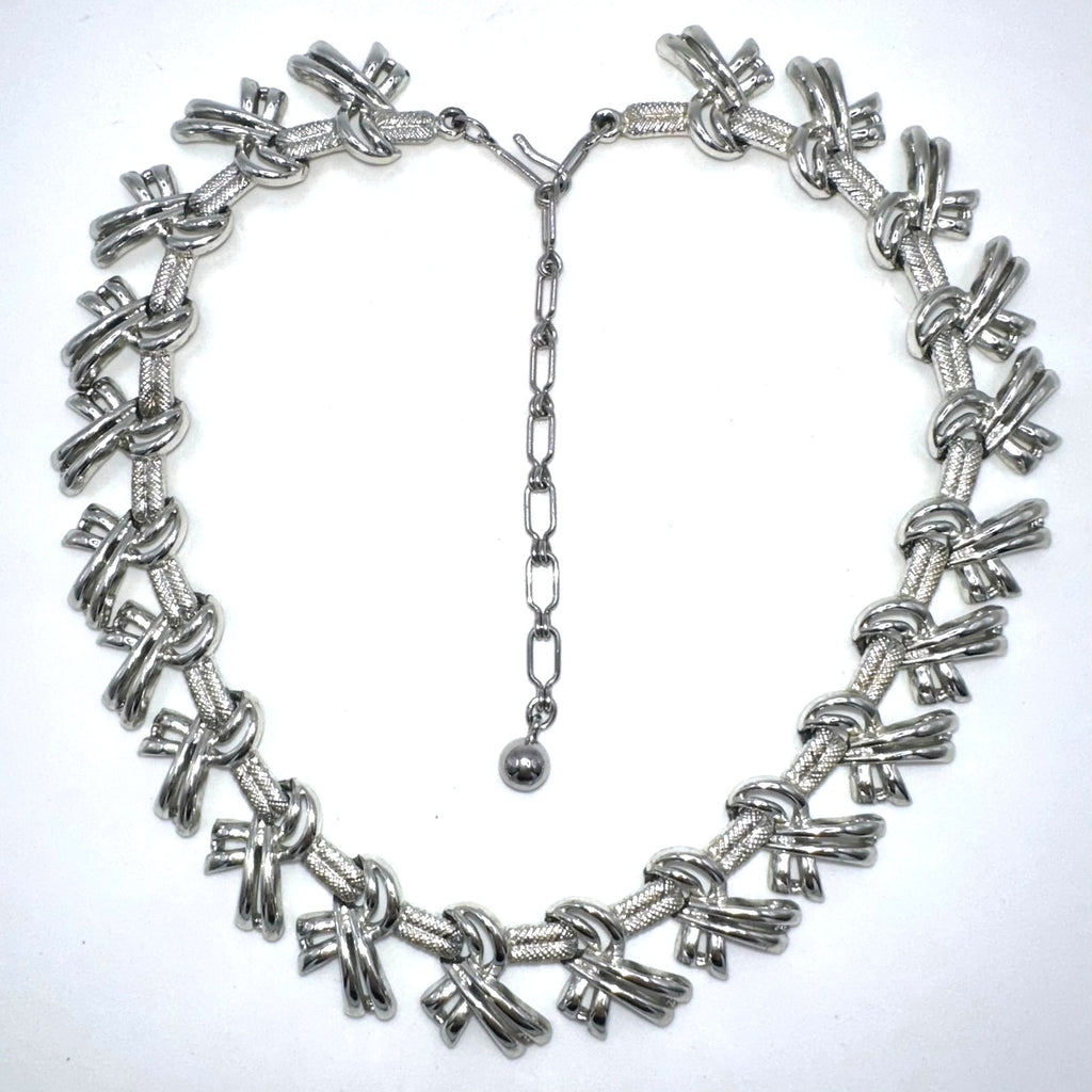 Kramer signed vintage silver tone rhodium plated bows ribbons chain 16” necklace