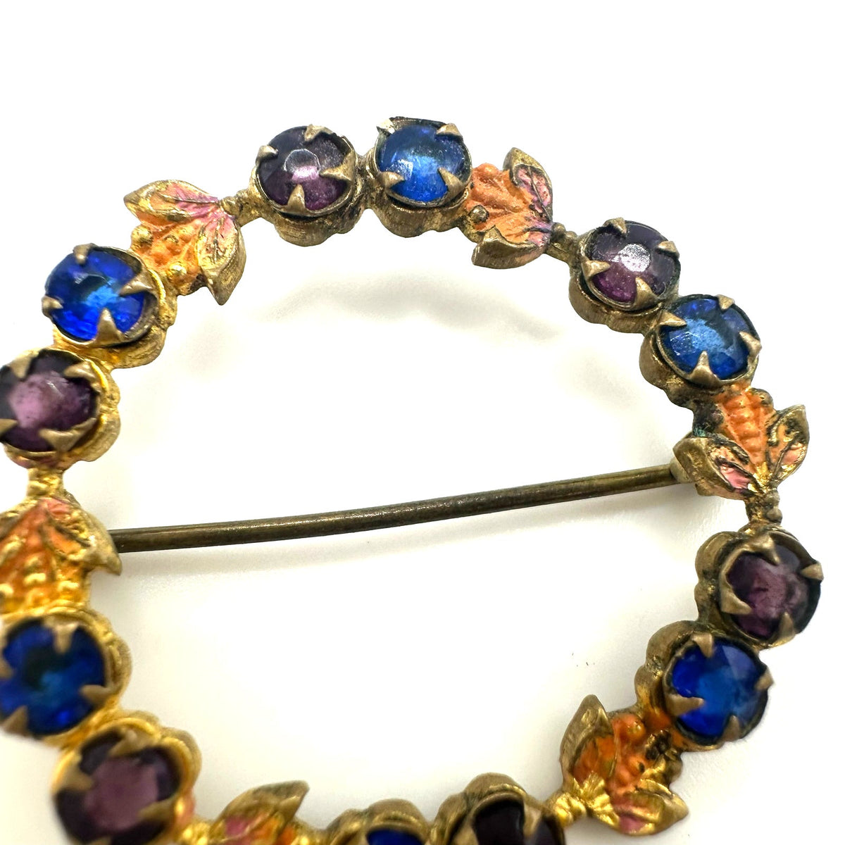 Antique gold tone blue purple Czech glass rhinestones enamel wreath brooch