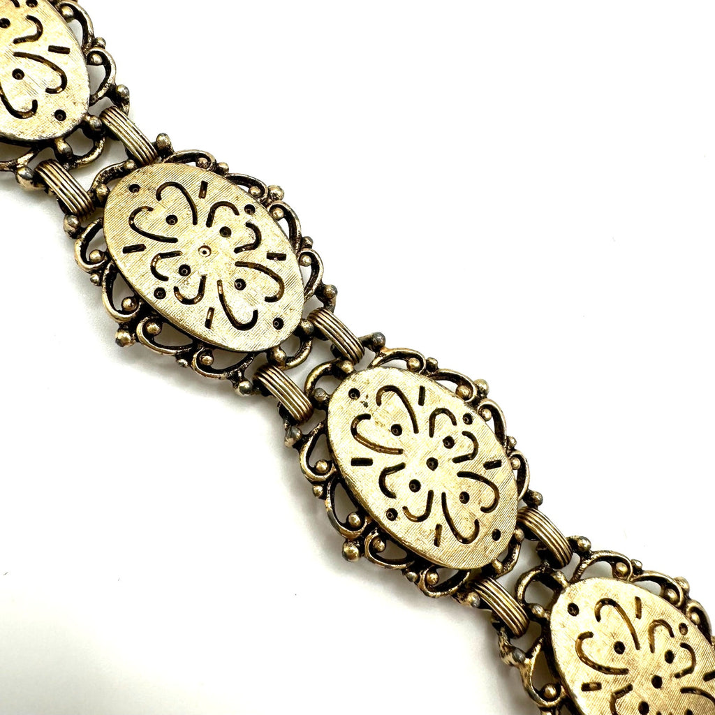 Emmons vintage gold tone dogwood floral textured flex link chain bracelet 7.25"