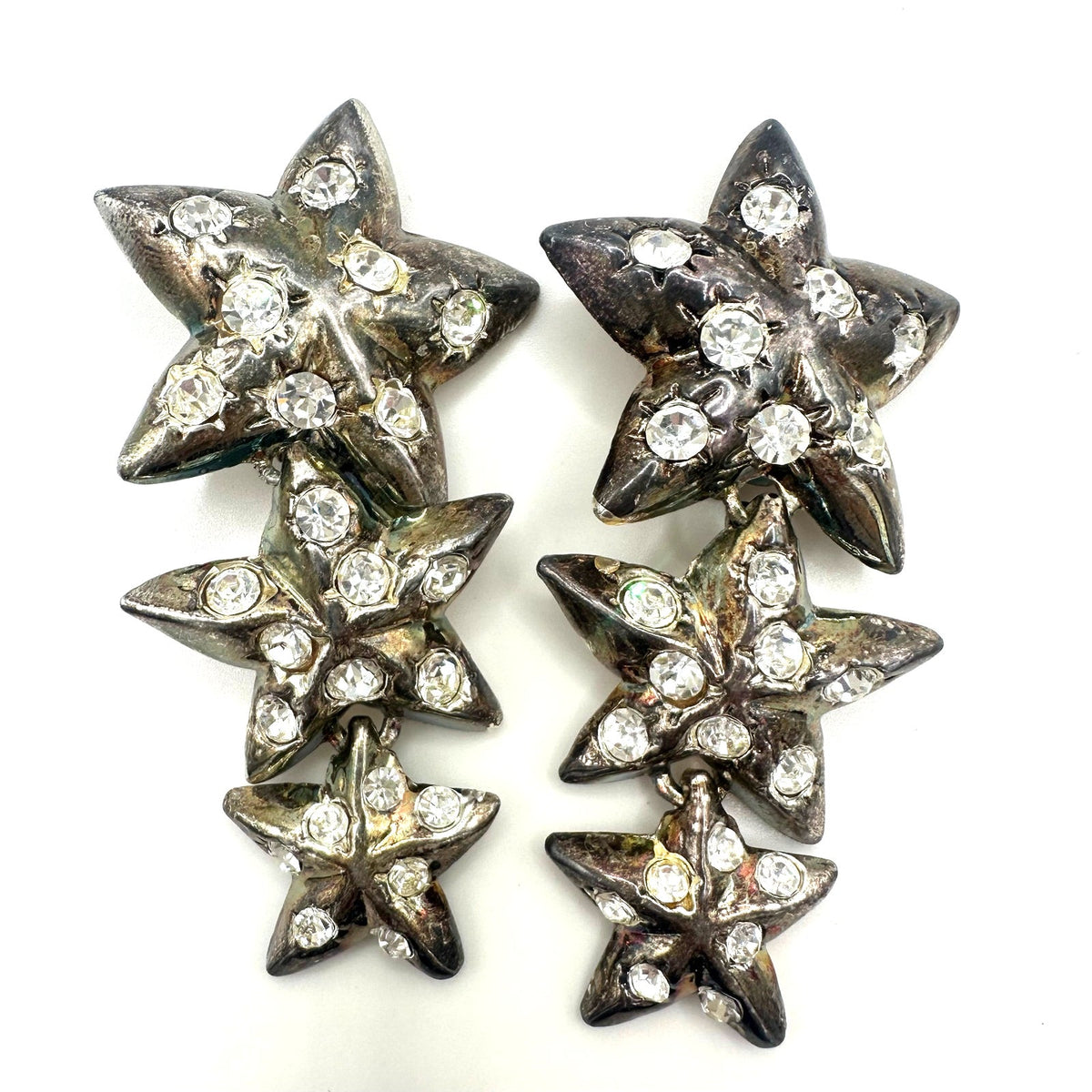 Vintage 1990s silver tone clear rhinestones 3 stars dangle drop clip on earrings
