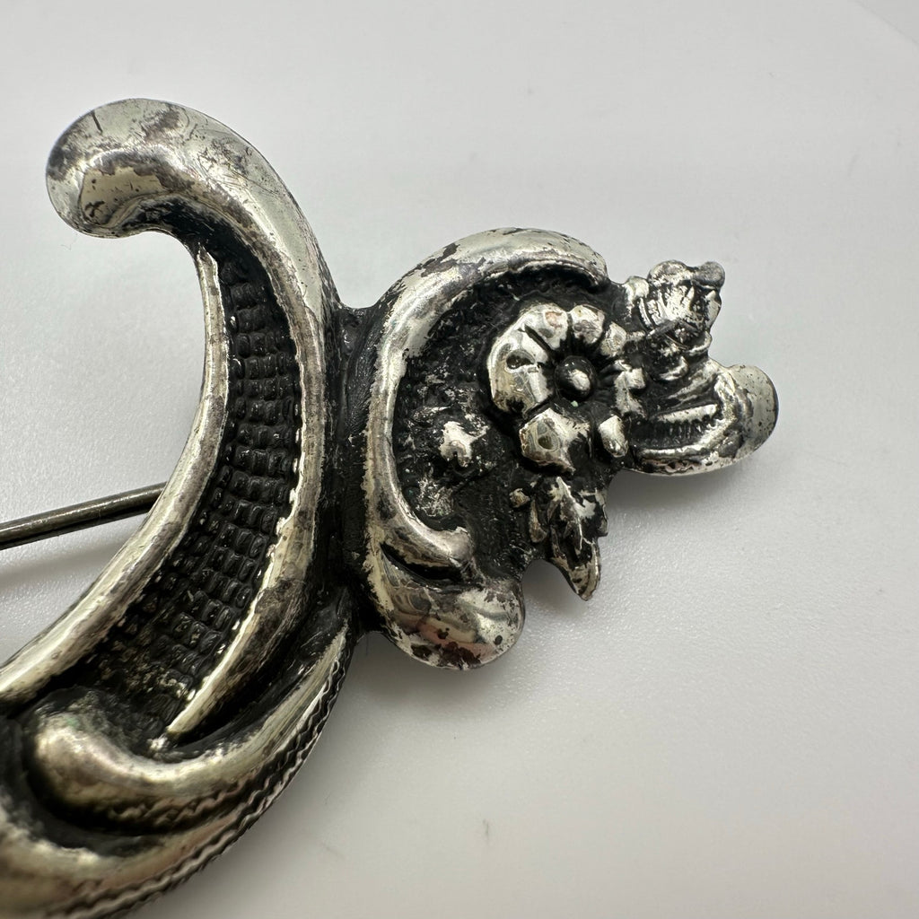 Vintage silver tone Art Nouveau Revival embossed scrollwork floral brooch