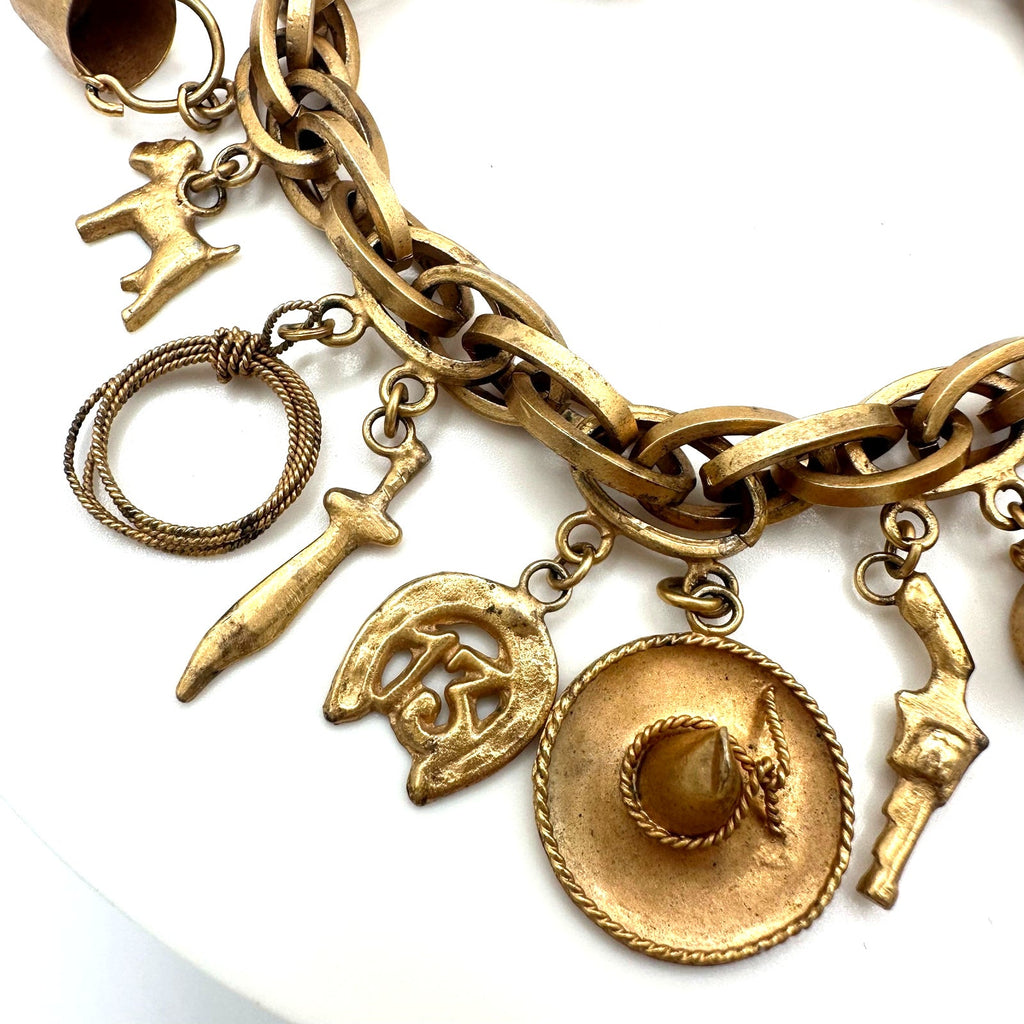 Vintage Made in Mexico midcentury gold tone 16 charms chain bracelet 7.5"