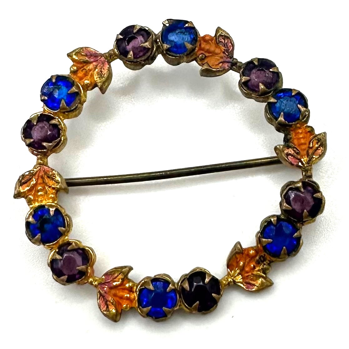 Antique gold tone blue purple Czech glass rhinestones enamel wreath brooch