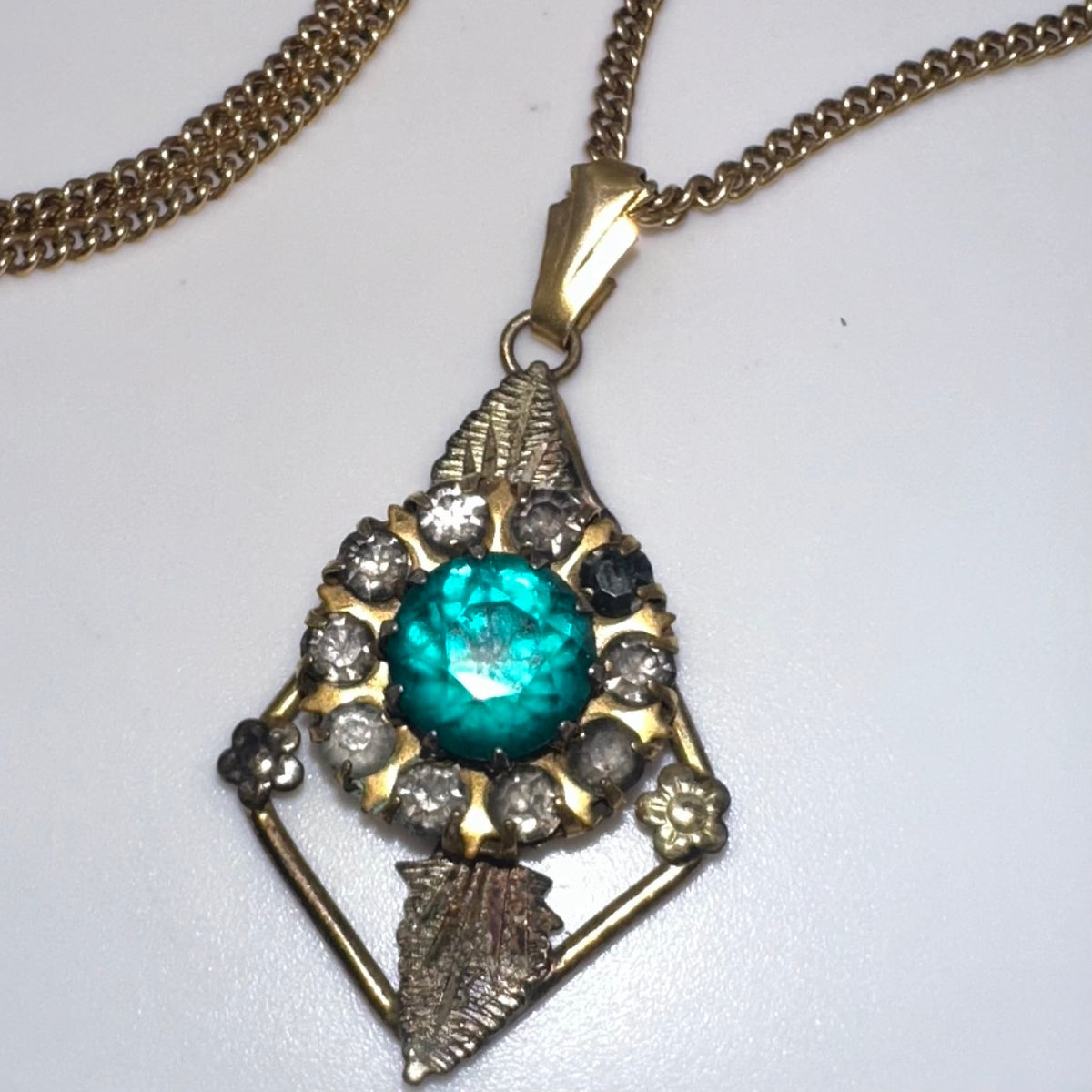 Vintage 12kt gold filled green rhinestones pendant on Lang 21” chain necklace