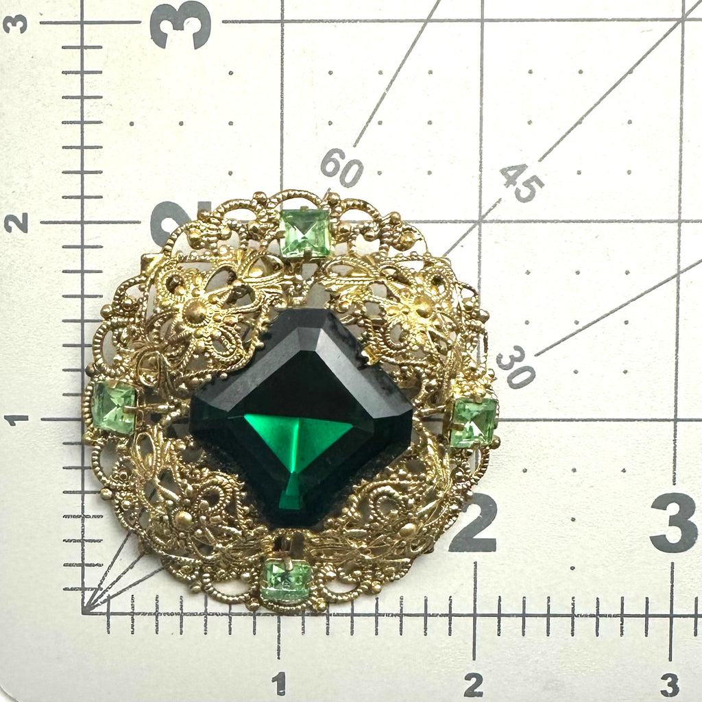 Vintage 1950s gold tone filigree massive emerald light green rhinestones brooch