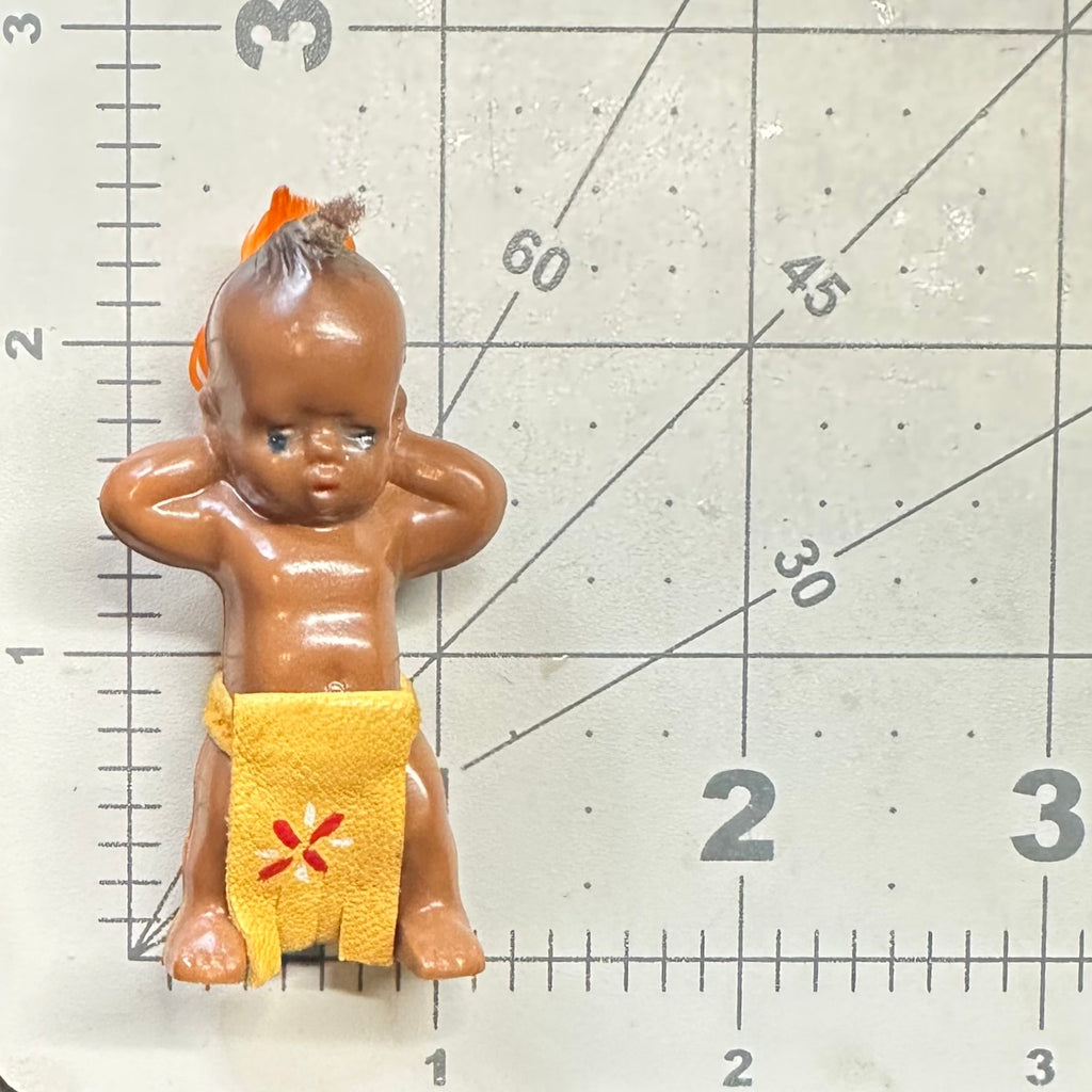 1940s vintage plastic Native American kewpie doll-style suede figural brooch
