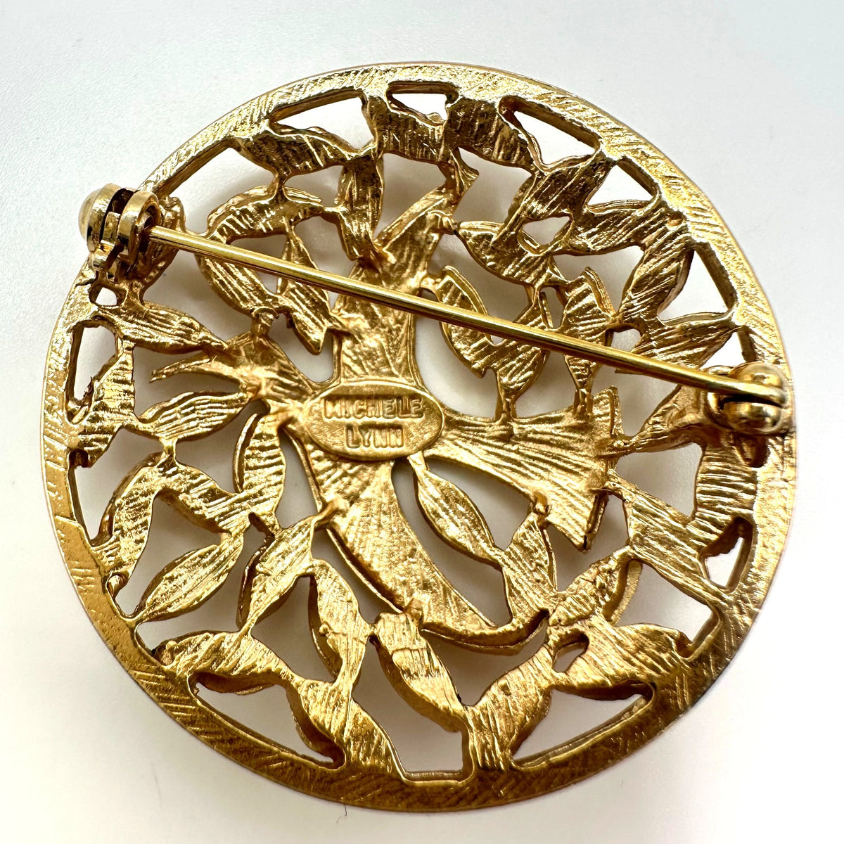 Michele Lynn signed vintage gold tone dove bird leaves round circular brooch