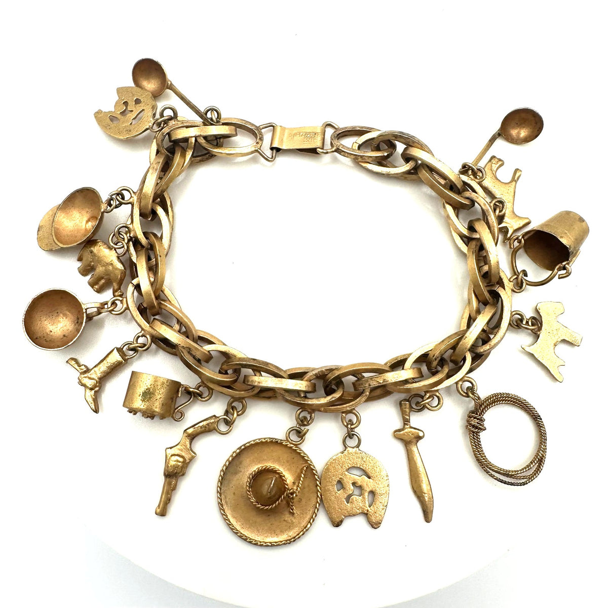 Vintage Made in Mexico midcentury gold tone 16 charms chain bracelet 7.5"