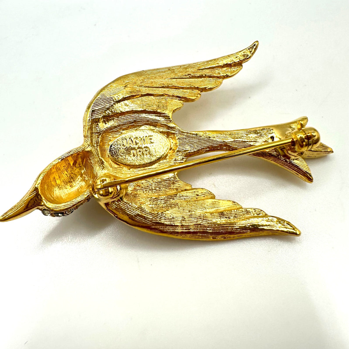 Jackie Orr vintage gold tone clear glass rhinestones pearl bird brooch