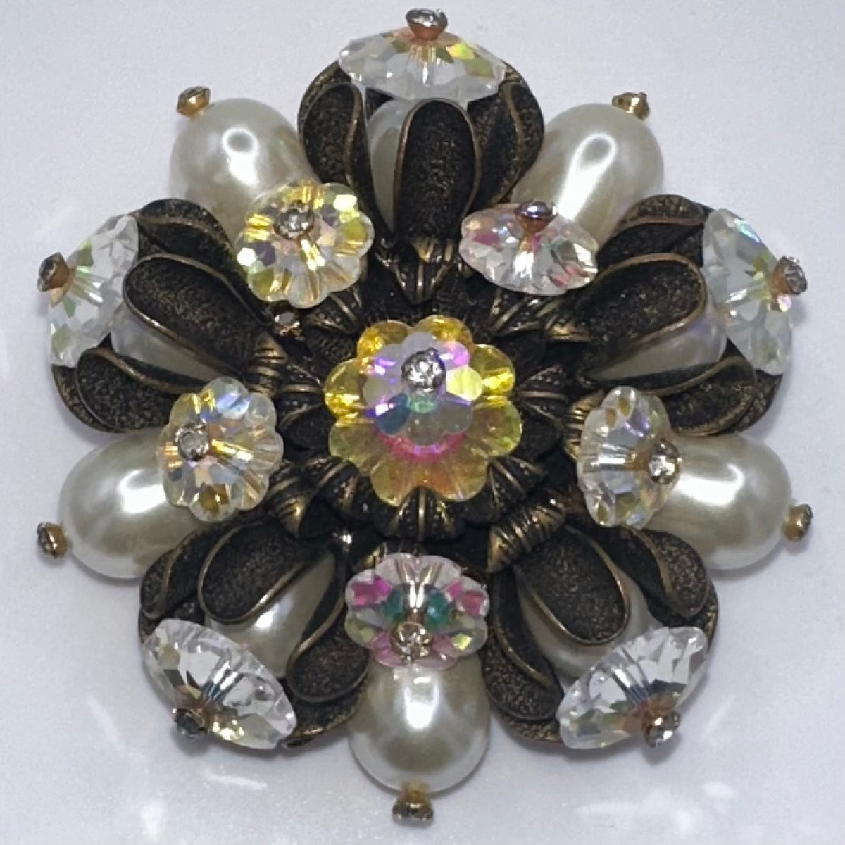 Unsigned Schiaparelli gold tone aurora borealis AB margarita faux pearls brooch