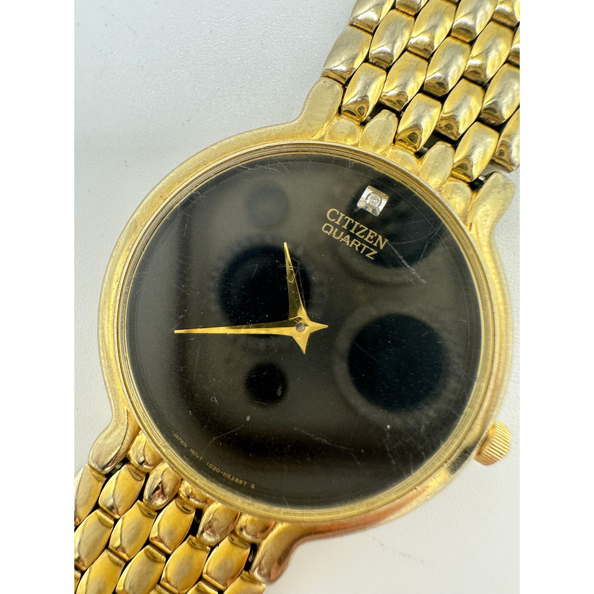 Citizen vintage 1020-954562 Quartz gold black round dial stainless steel watch