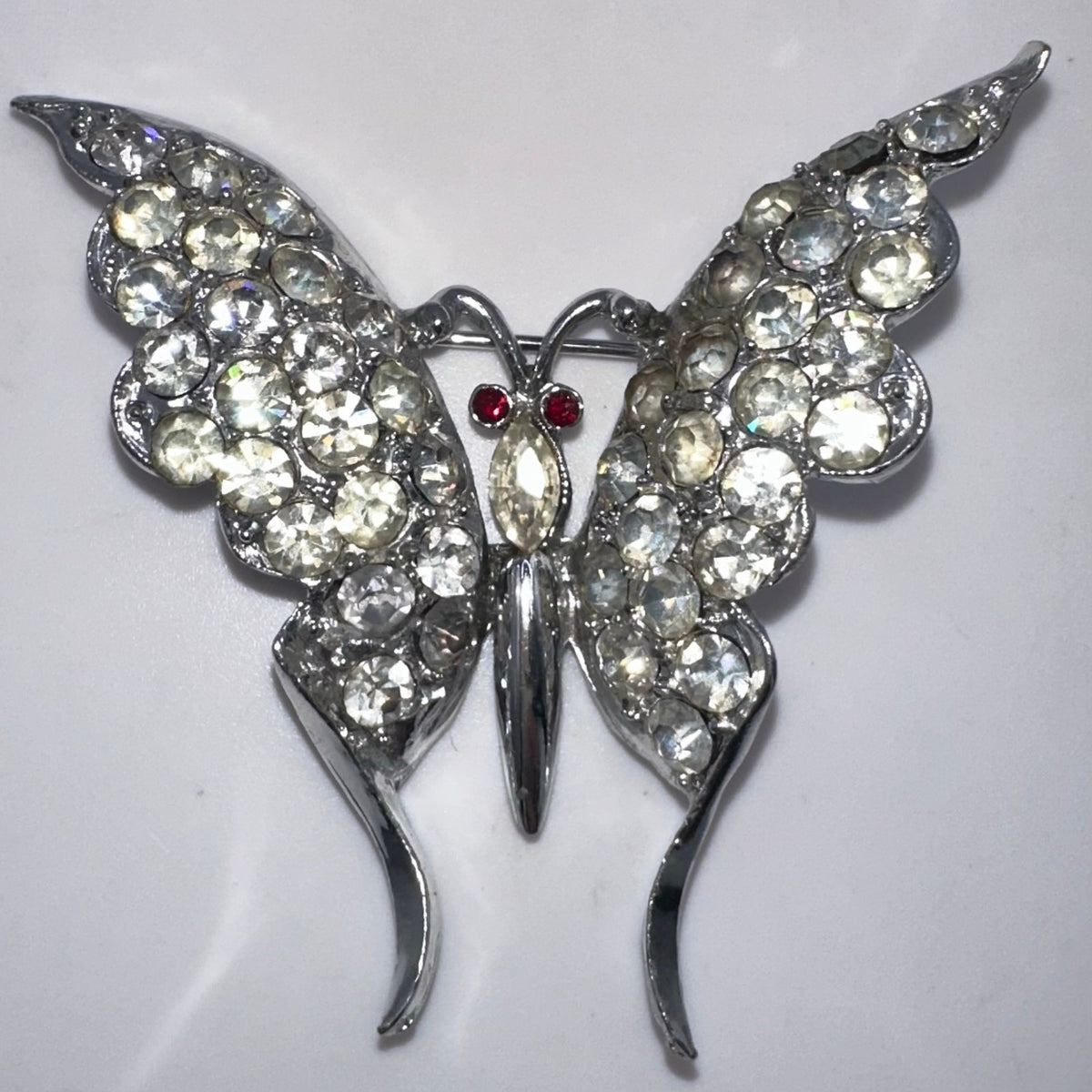 Vintage 1940s silver tone rhodium plated clear red rhinestones butterfly brooch