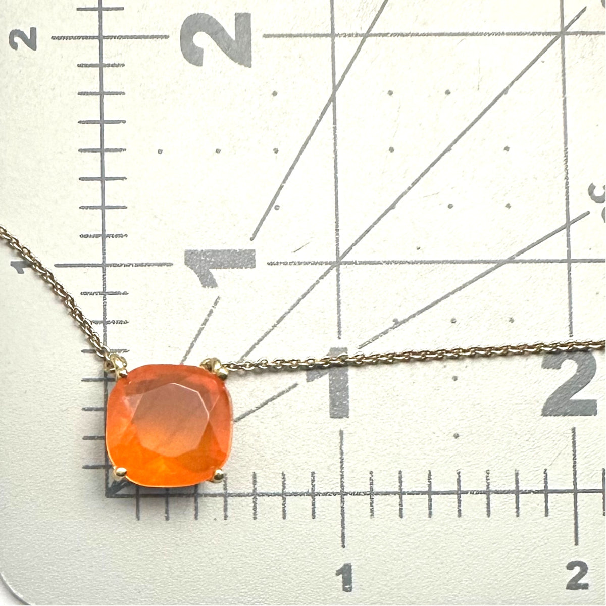 Kate Spade Cause a Stir gold plated opaque orange rhinestone pendant necklace