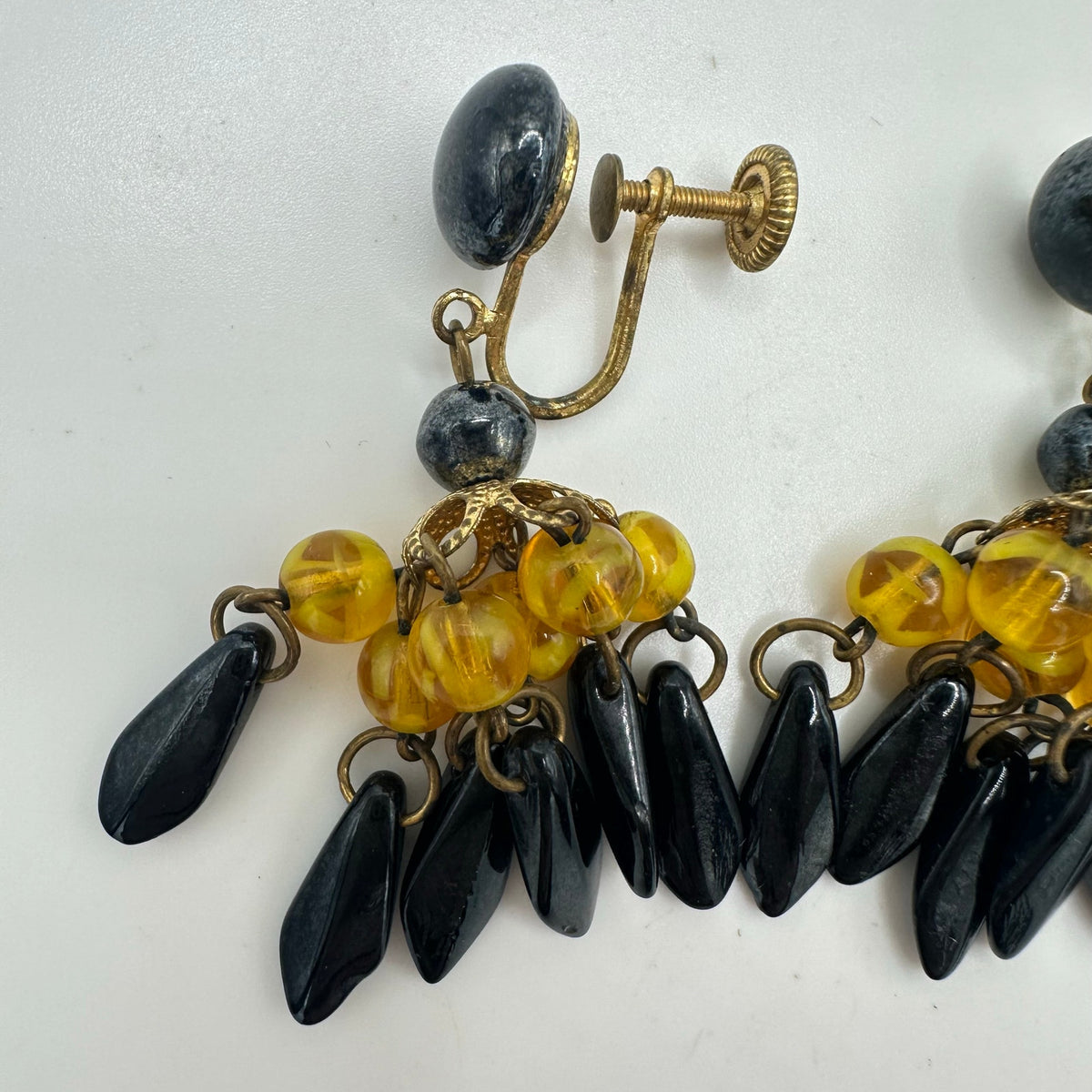 West Germany vintage gold yellow black glass beaded dangle screw back earrings