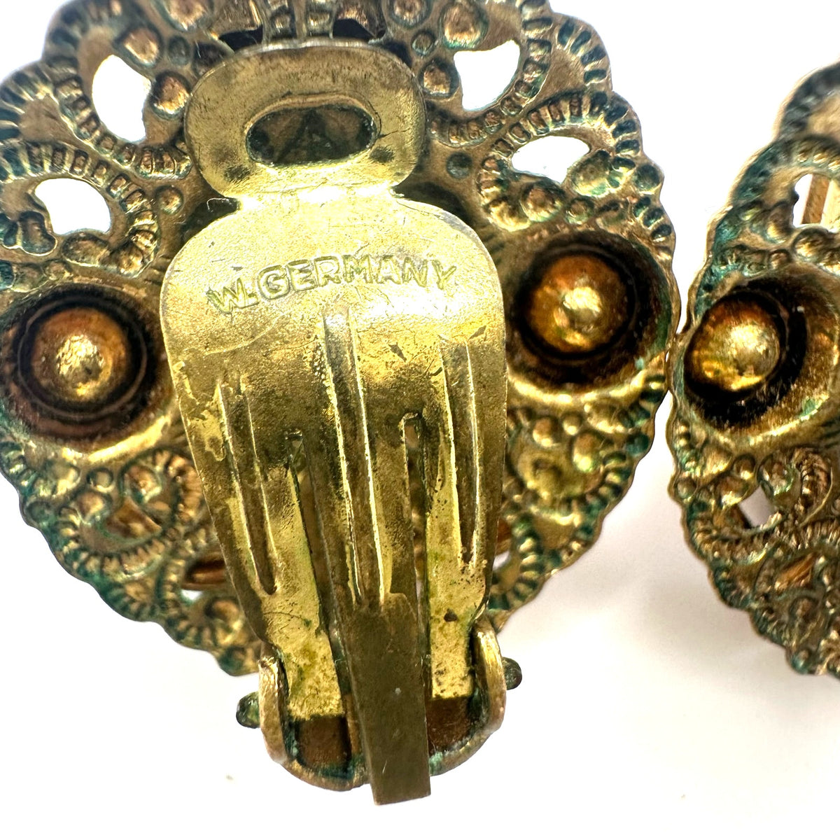 West Germany vintage gold tone filigree purple rhinestones clip on earrings