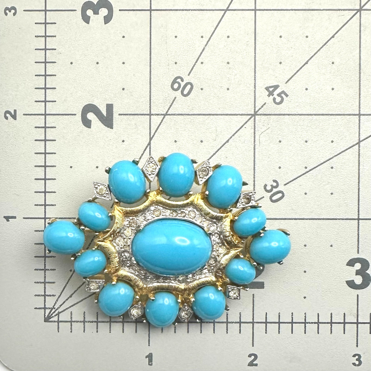 Polcini vintage gold tone clear rhinestones turquoise glass cabochons brooch