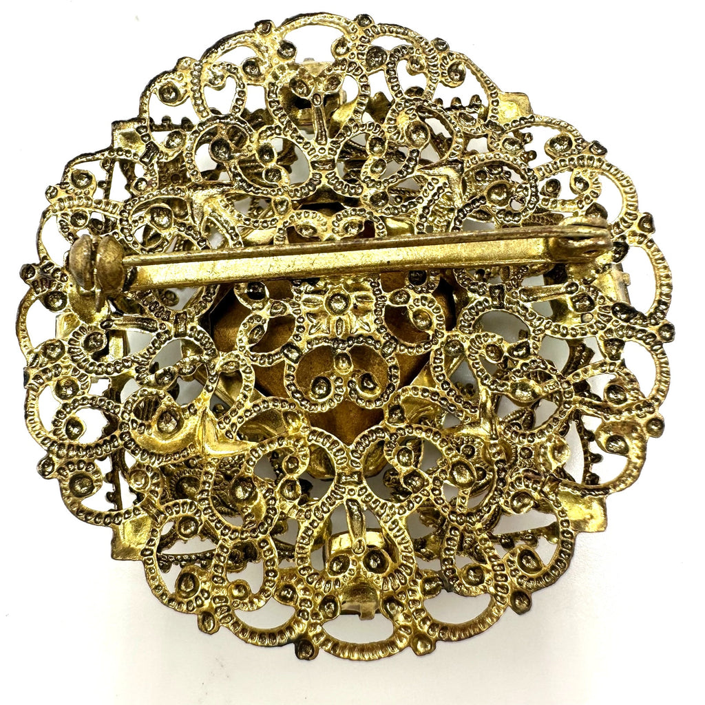 Vintage 1950s gold tone filigree massive emerald light green rhinestones brooch