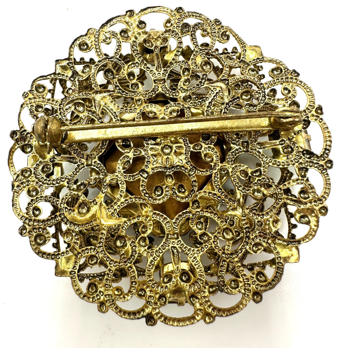 Vintage 1950s gold tone filigree massive emerald light green rhinestones brooch