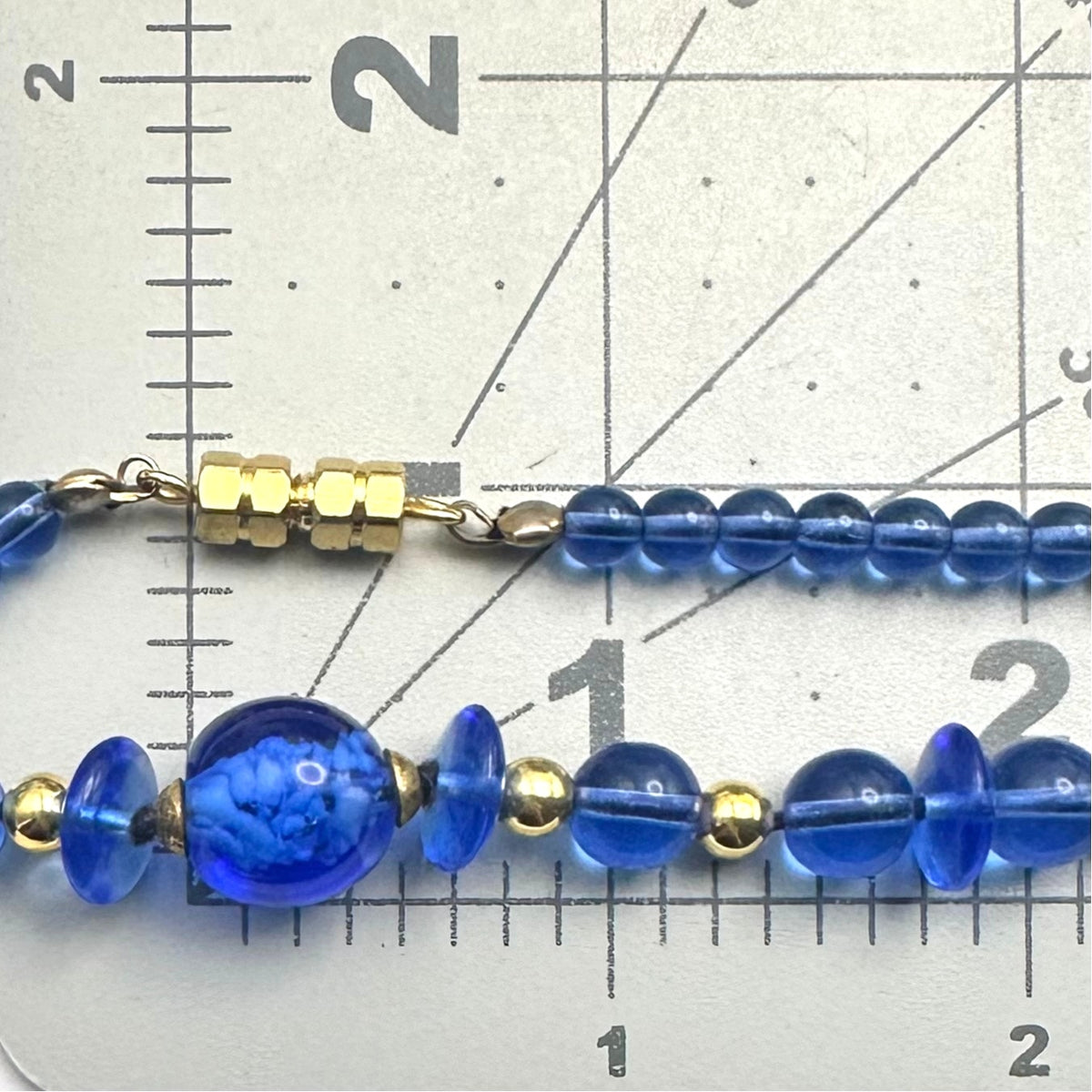 Vintage Art Deco Revival blue glass beads gold tone 21" graduated necklace