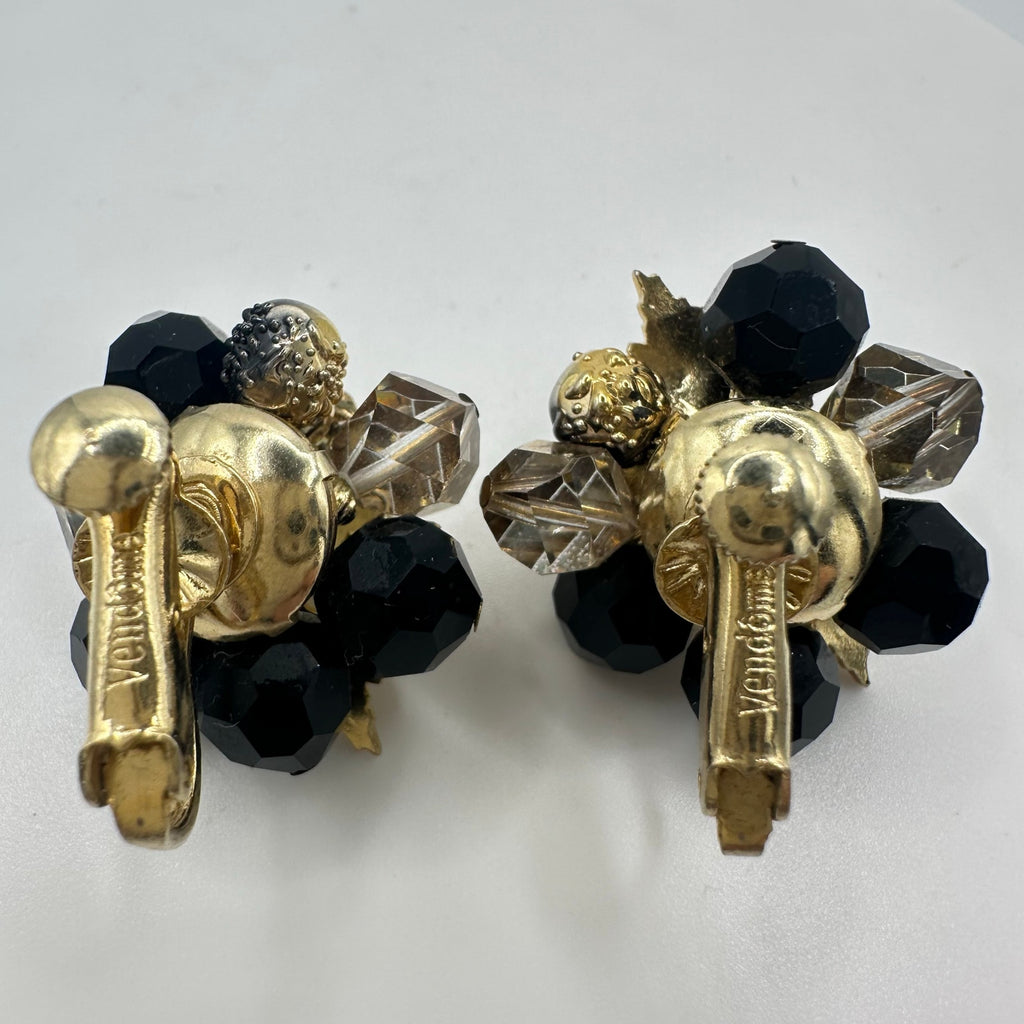 Vendome gold tone leaves black glass beads beaded cluster clip on earrings