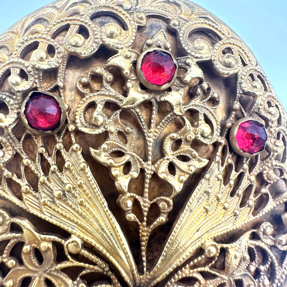 Antique 1900s Arts & Crafts gold gilt rose cut red paste glass sash pin brooch