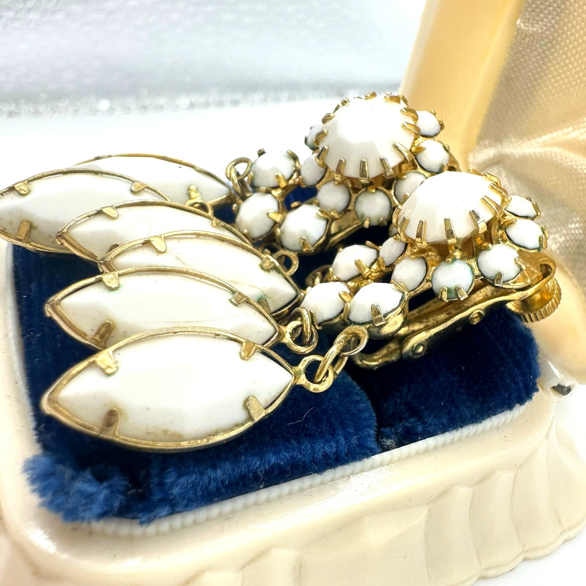Vendome gold tone white milk glass rhinestones dangle clip on earrings