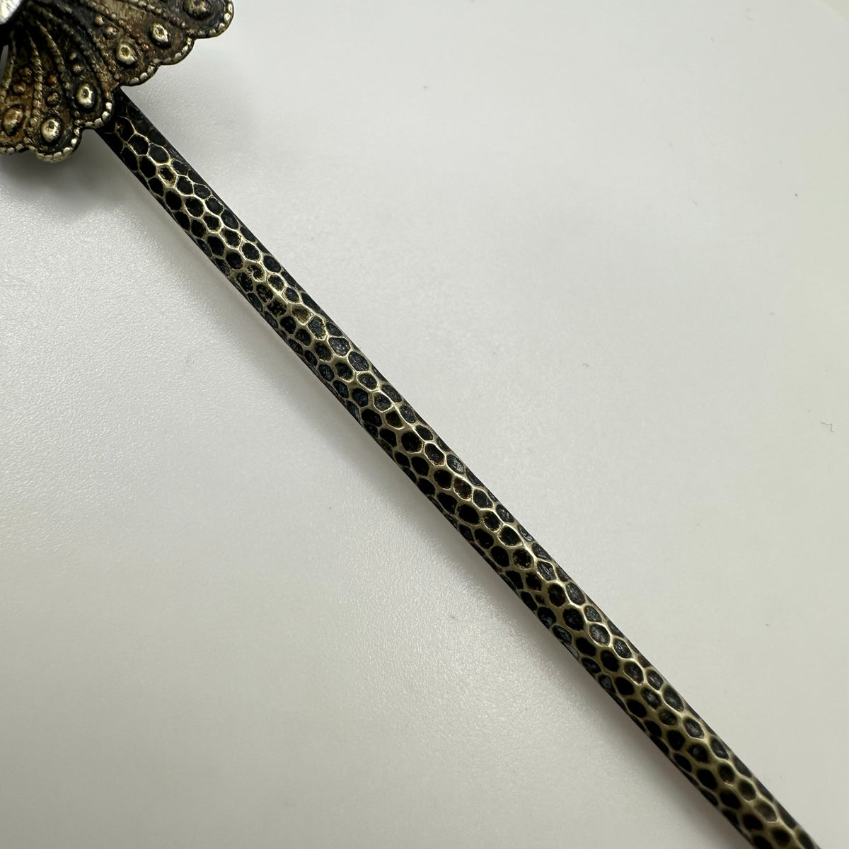 Antique Victorian silver tone textured butterfly clear paste gemstone stick pin