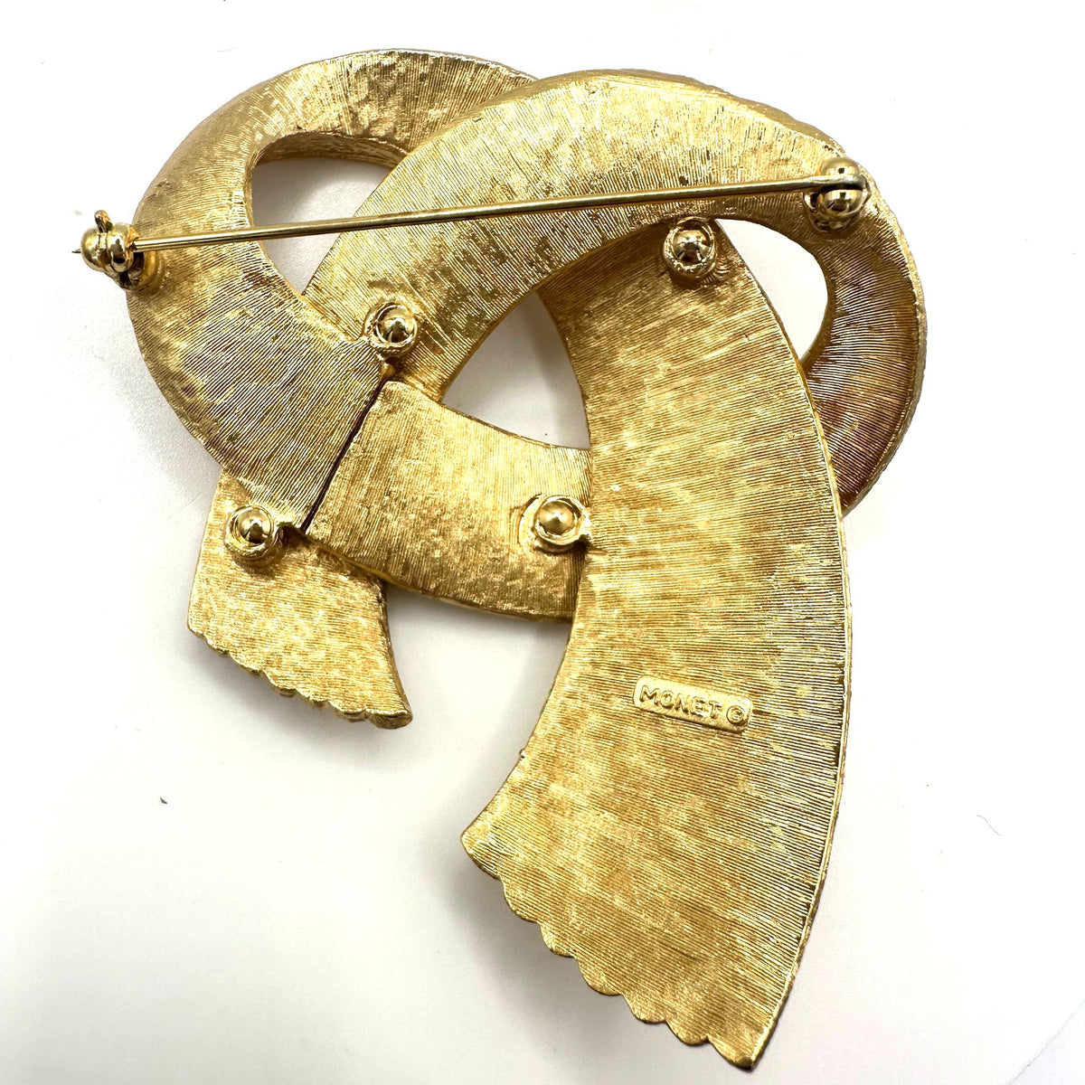 Monet signed vintage gold tone twisted rope ribbon textured 3D brooch