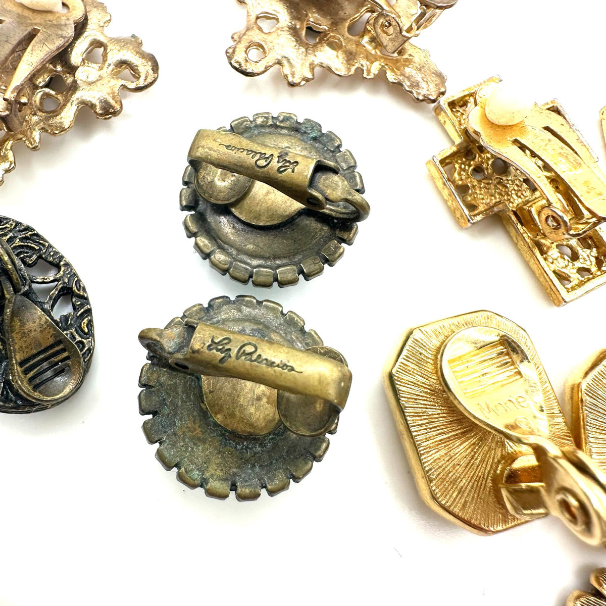 Bundle jewelry lot 7 pairs vintage gold tone clip on earrings 1928 Trifari Monet
