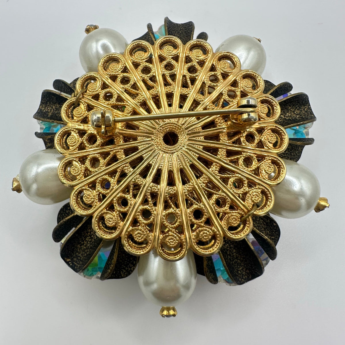 Unsigned Schiaparelli gold tone aurora borealis AB margarita faux pearls brooch