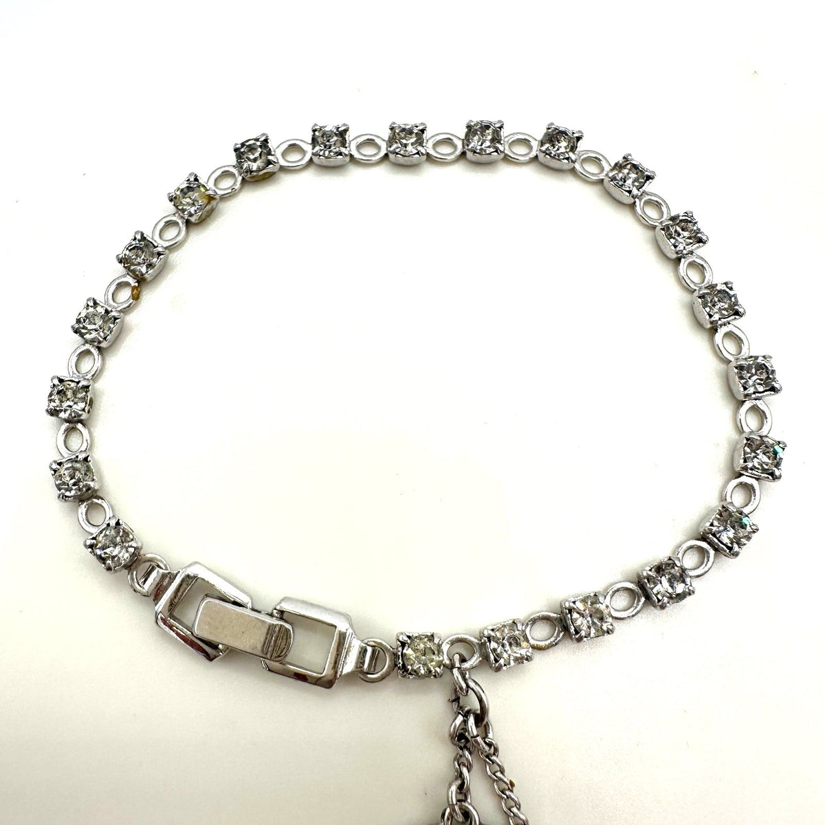 Crown Trifari silver tone rhinestones dangling hearts tennis 6.5" bracelet