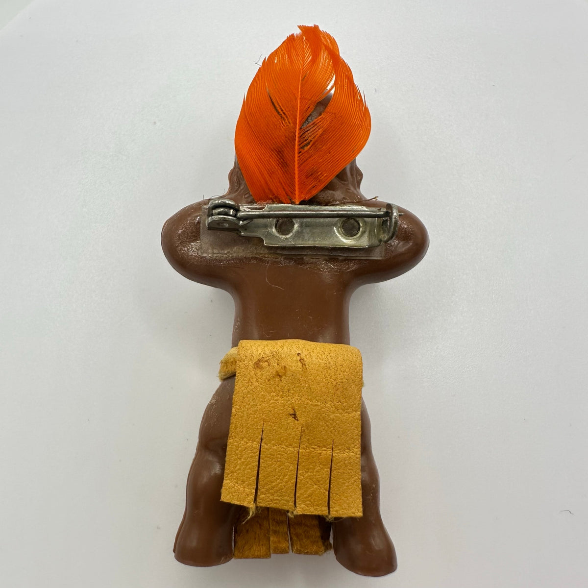 1940s vintage plastic Native American kewpie doll-style suede figural brooch