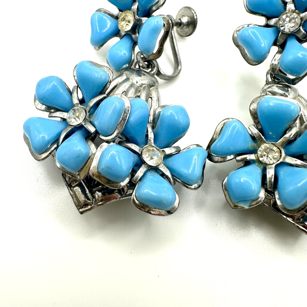 Vintage silver tone blue celluloid flowers rhinestone dangle screw back earrings