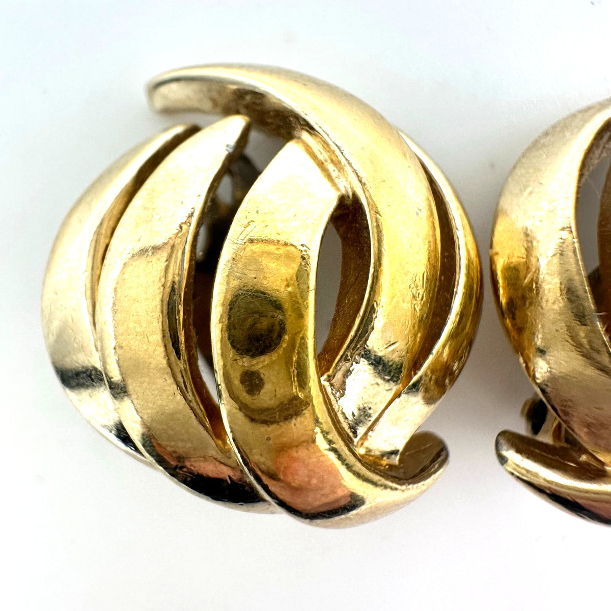 Panetta signed vintage signed gold tone domed abstract leaf clip on earrings