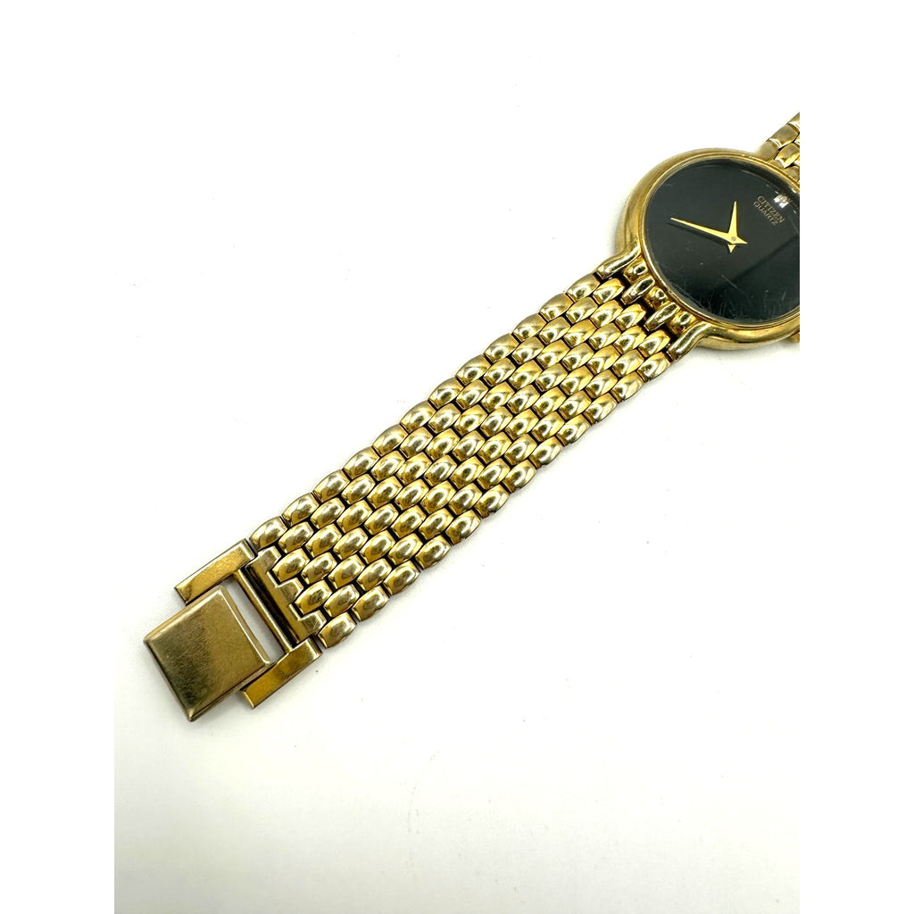Citizen vintage 1020-954562 Quartz gold black round dial stainless steel watch