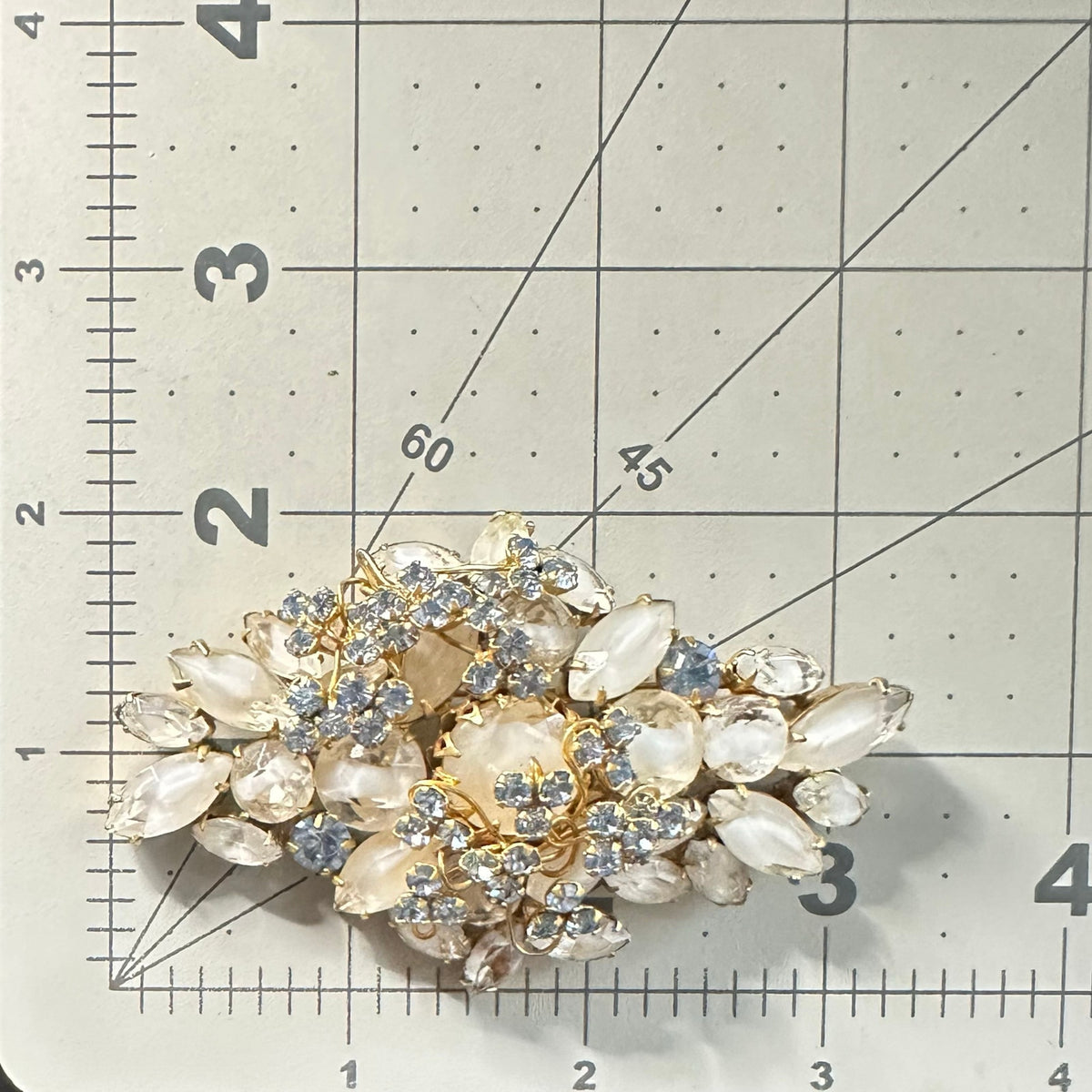 Unsigned 1950s vintage large gold tone blue clear givre glass rhinestones brooch