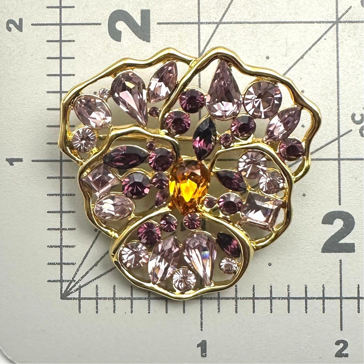 Nolan Miller vintage gold tone purple topaz rhinestones pansy flower brooch