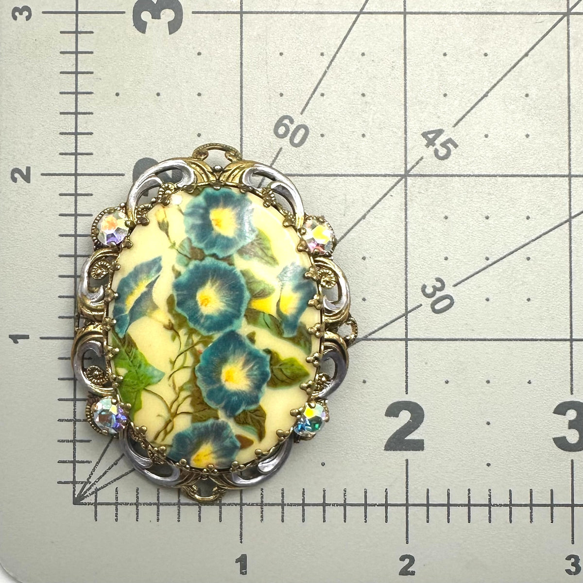 West Germany vintage gold tone floral portrait purple enamel rhinestones brooch