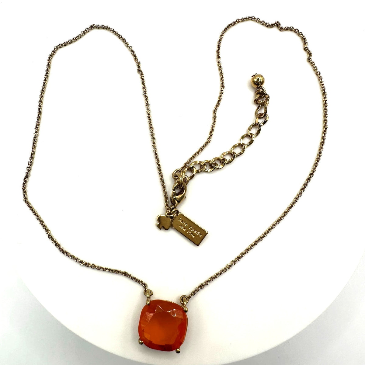 Kate Spade Cause a Stir gold plated opaque orange rhinestone pendant necklace