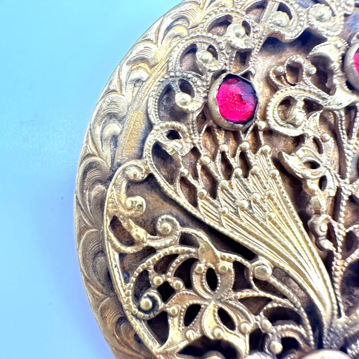 Antique 1900s Arts & Crafts gold gilt rose cut red paste glass sash pin brooch