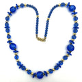 Vintage Art Deco Revival blue glass beads gold tone 21" graduated necklace