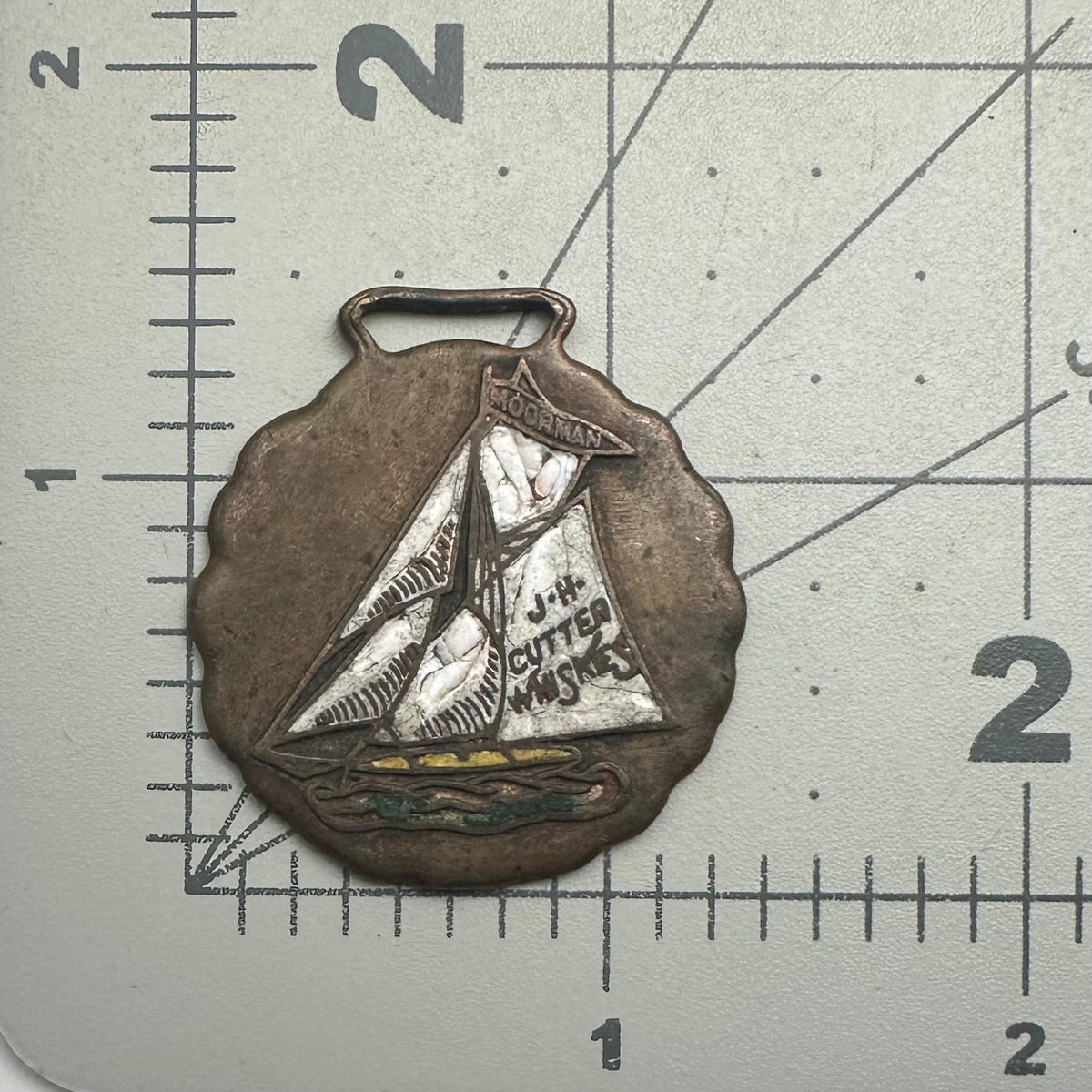 Antique 1800s 1900s J. H. Cutter Whiskies Moorman advertising pendant fob charm