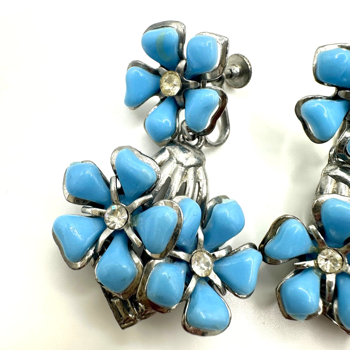 Vintage silver tone blue celluloid flowers rhinestone dangle screw back earrings